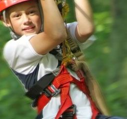 Child riding the zipline